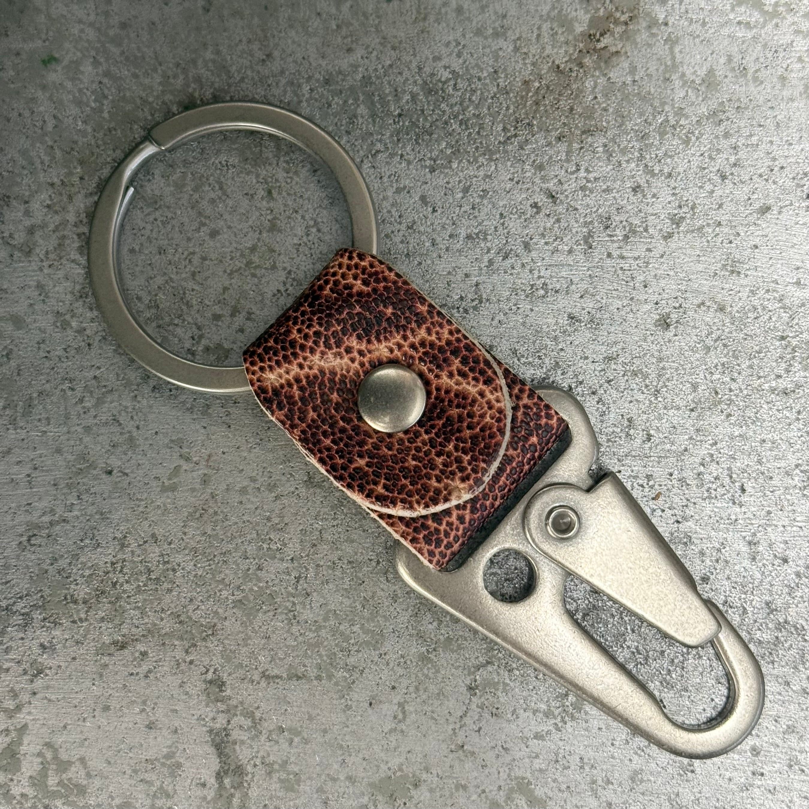 Toehold Red Ghost Key Fob showing a vibrant red ghost-shaped keychain with detailed design.