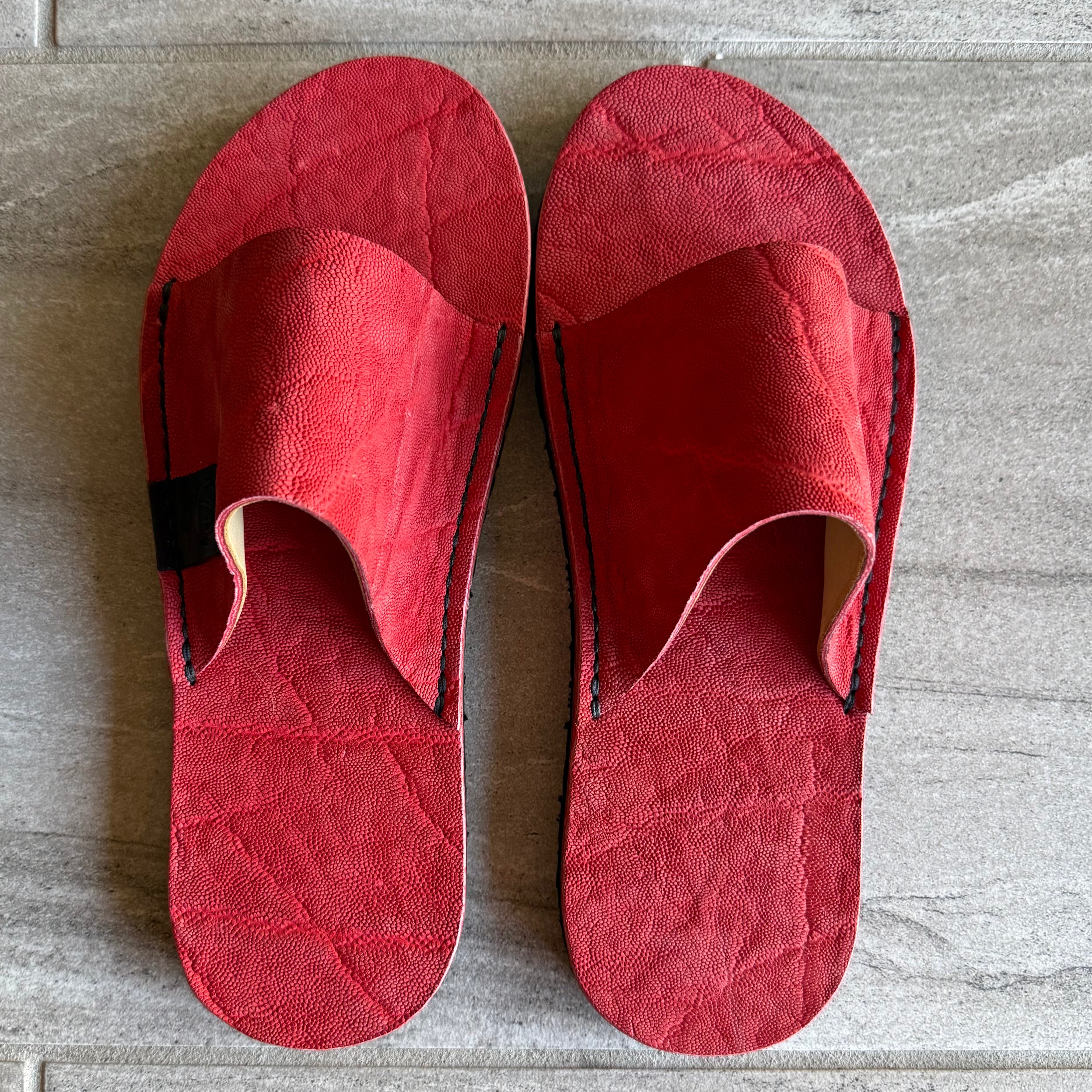 Red elephant slides by Toehold featuring comfortable straps and playful elephant design, suitable for casual wear.