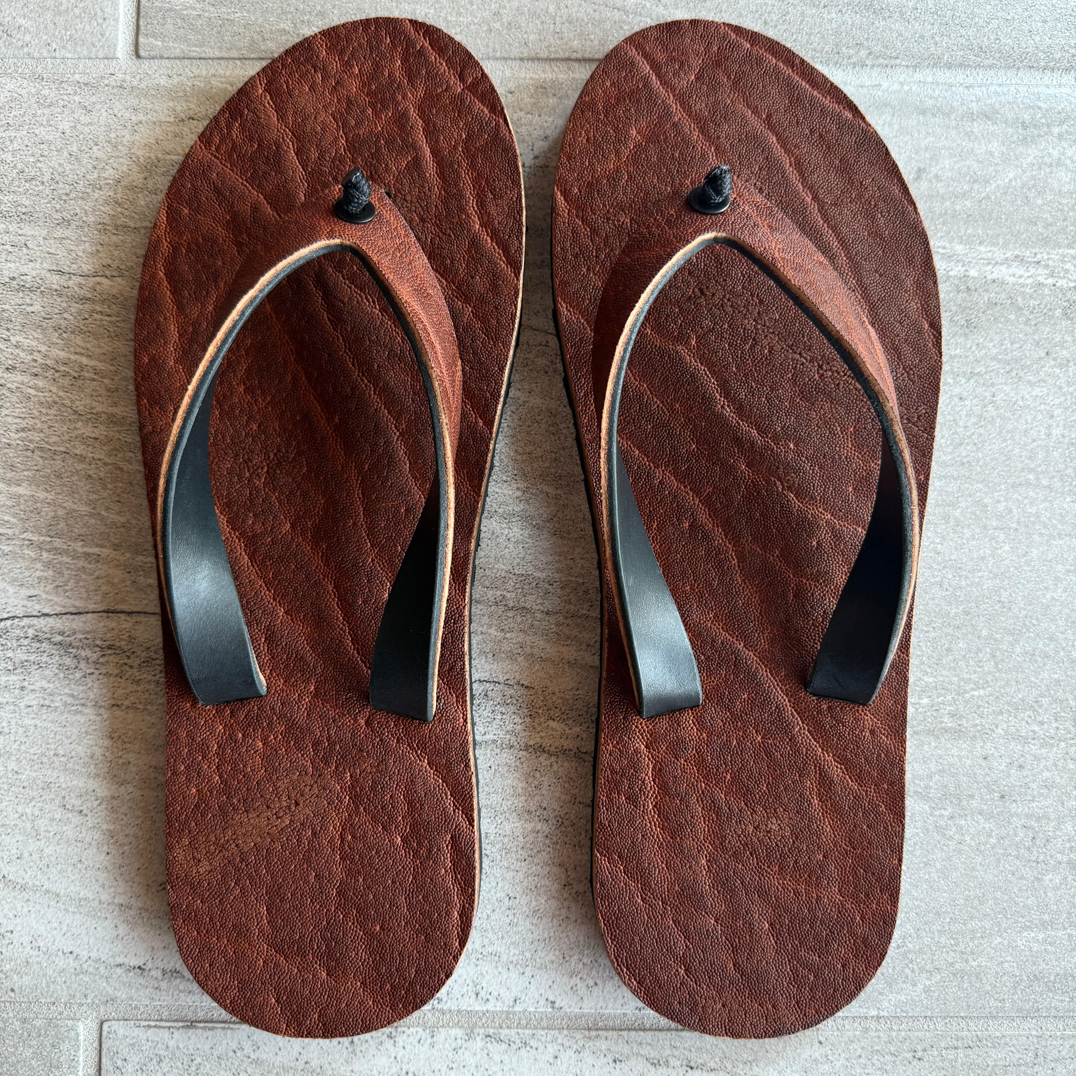 Brown African Elephant flip-flops by Toehold featuring elephant-shaped footbed design and casual slip-on style.