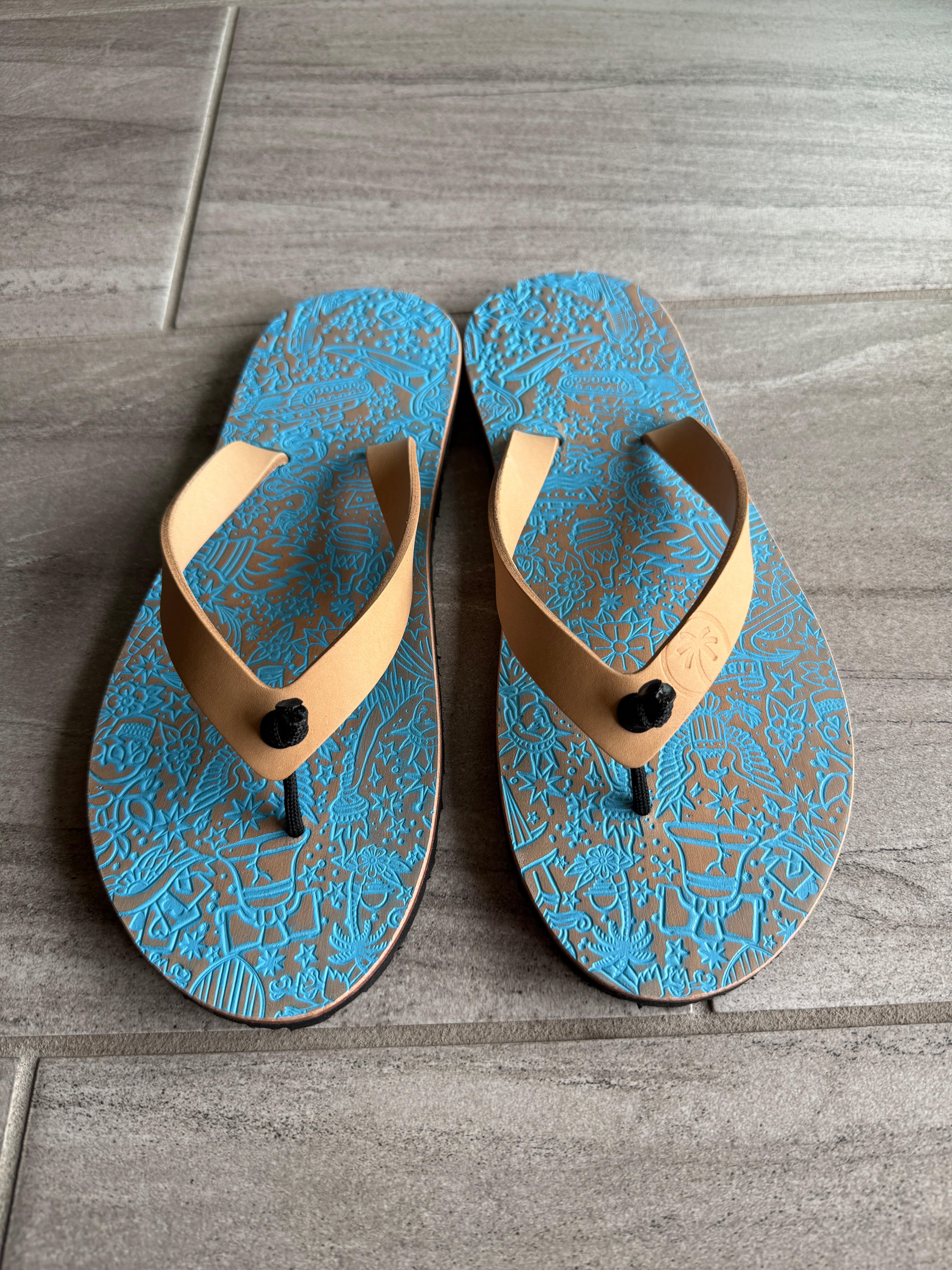 Toehold Freedom Flops flip-flops with white straps and cushioned sole, perfect for casual summer wear.