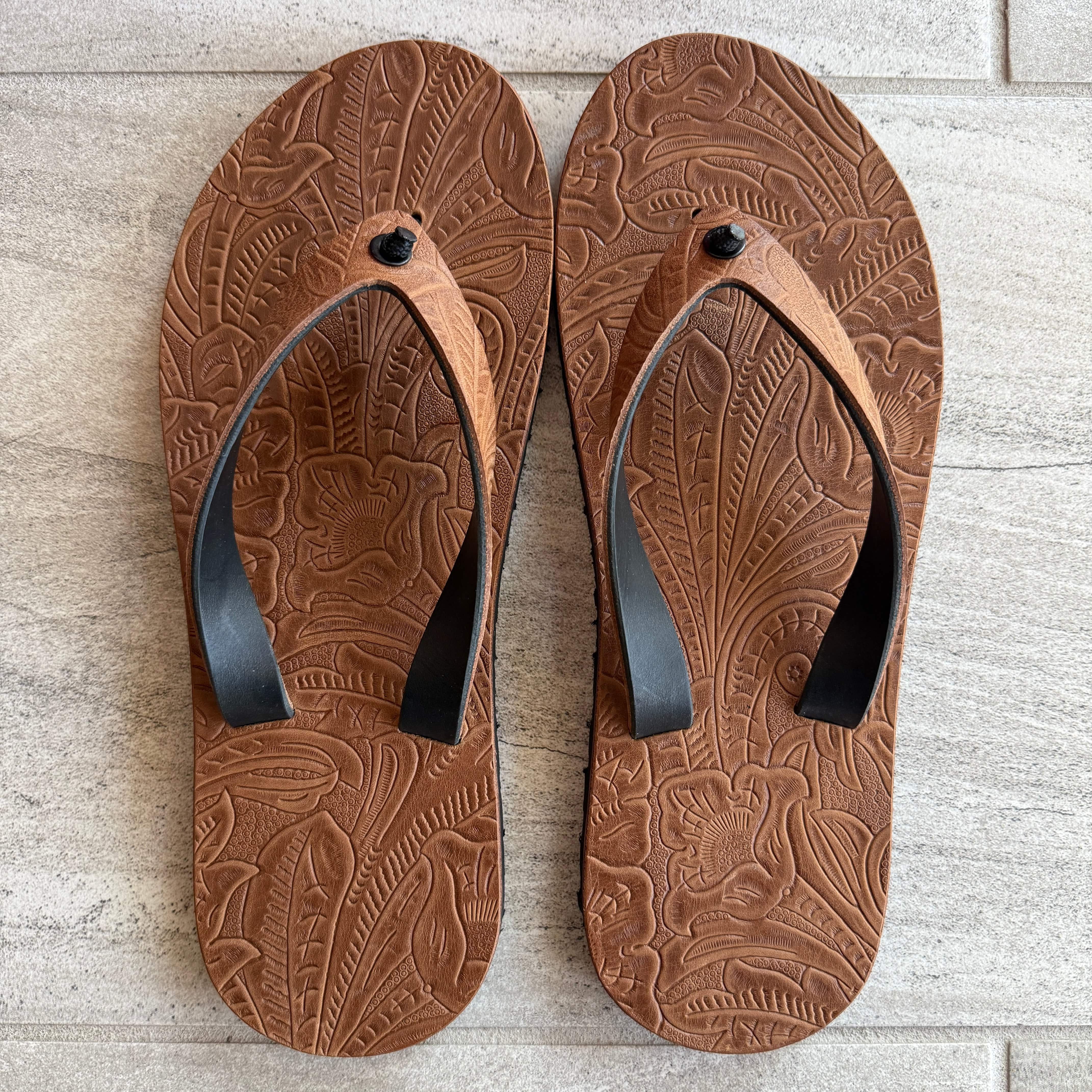 Toehold Desert Rose flip-flops with floral patterned straps and cushioned soles, perfect for casual summer wear.