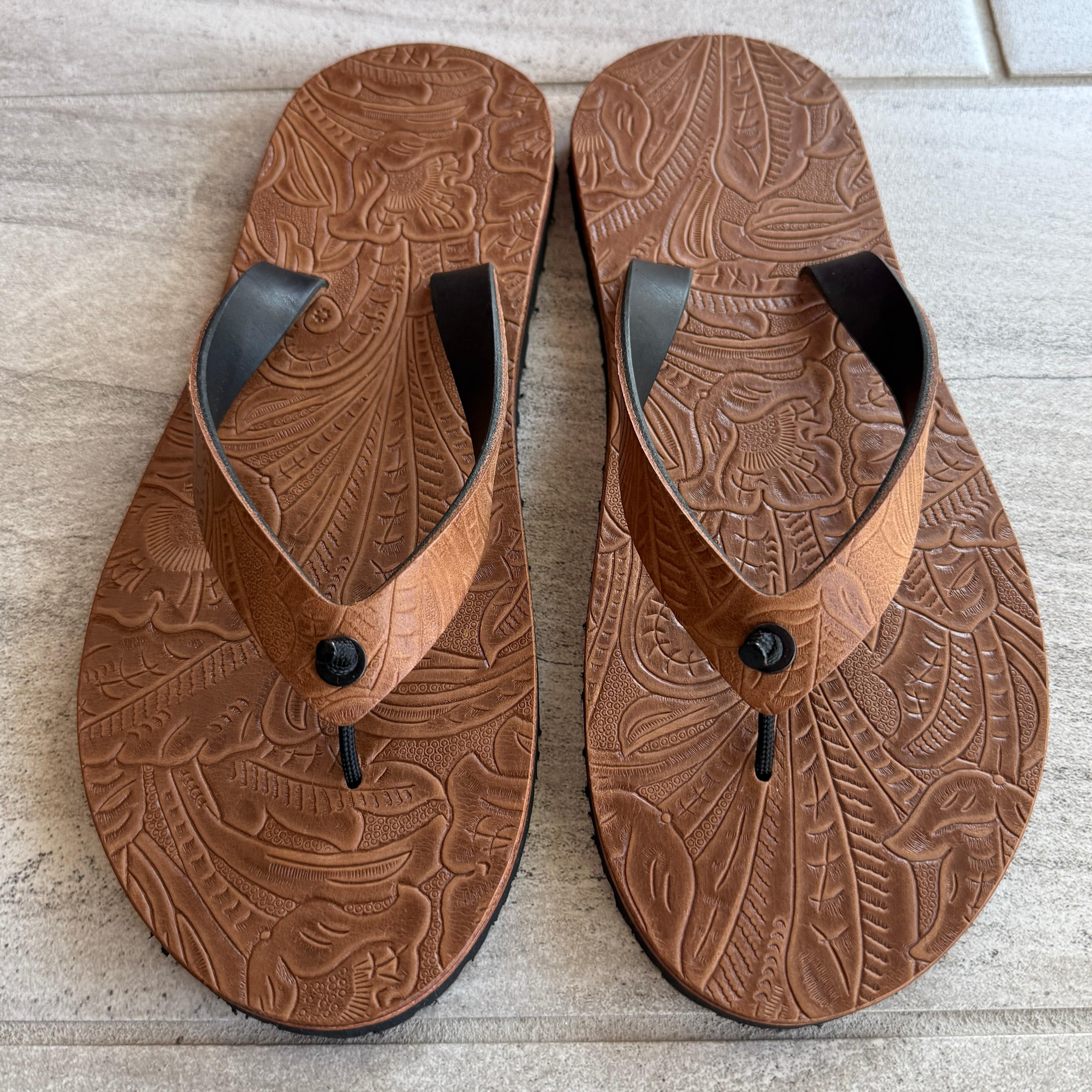 Toehold Desert Rose flip-flops with floral patterned straps and cushioned soles, perfect for casual summer wear.