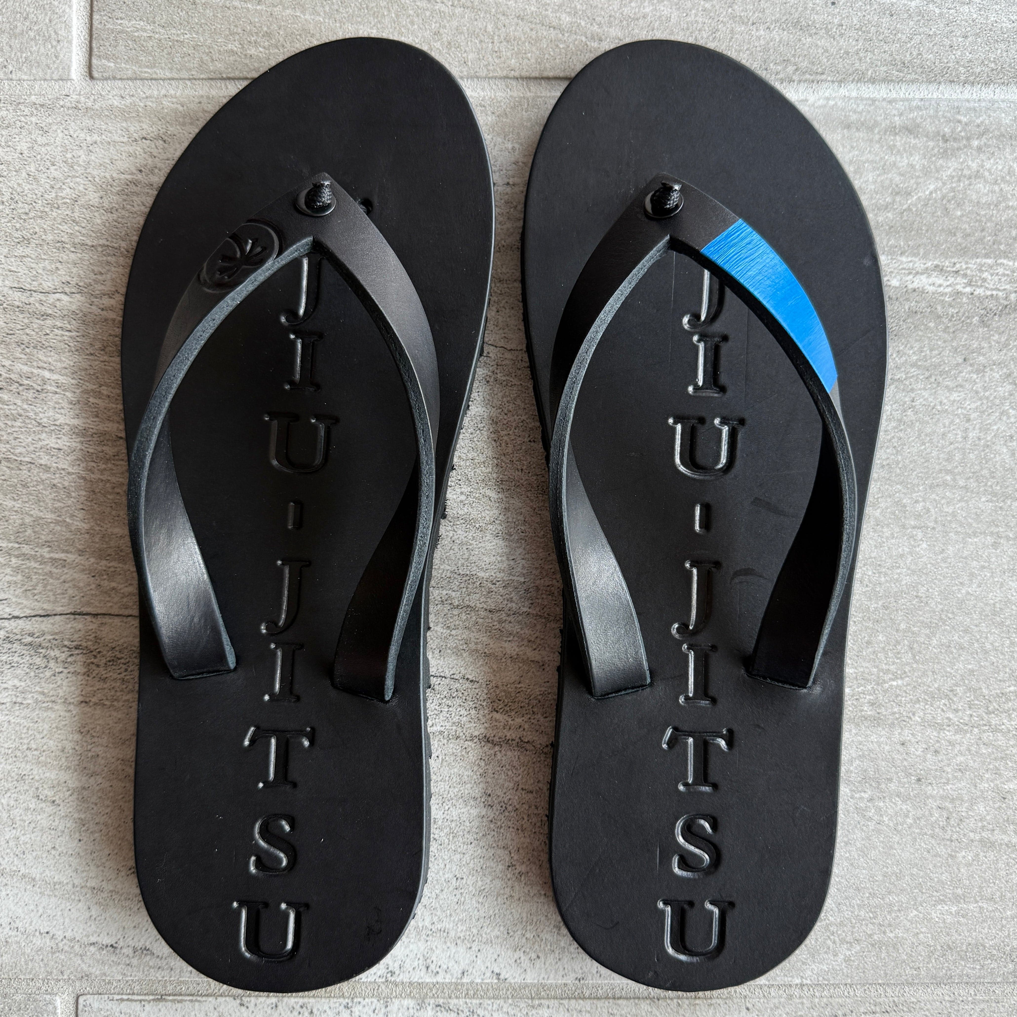 BlueToehold Flip-Flops with blue straps and textured soles, casual footwear for warm weather.