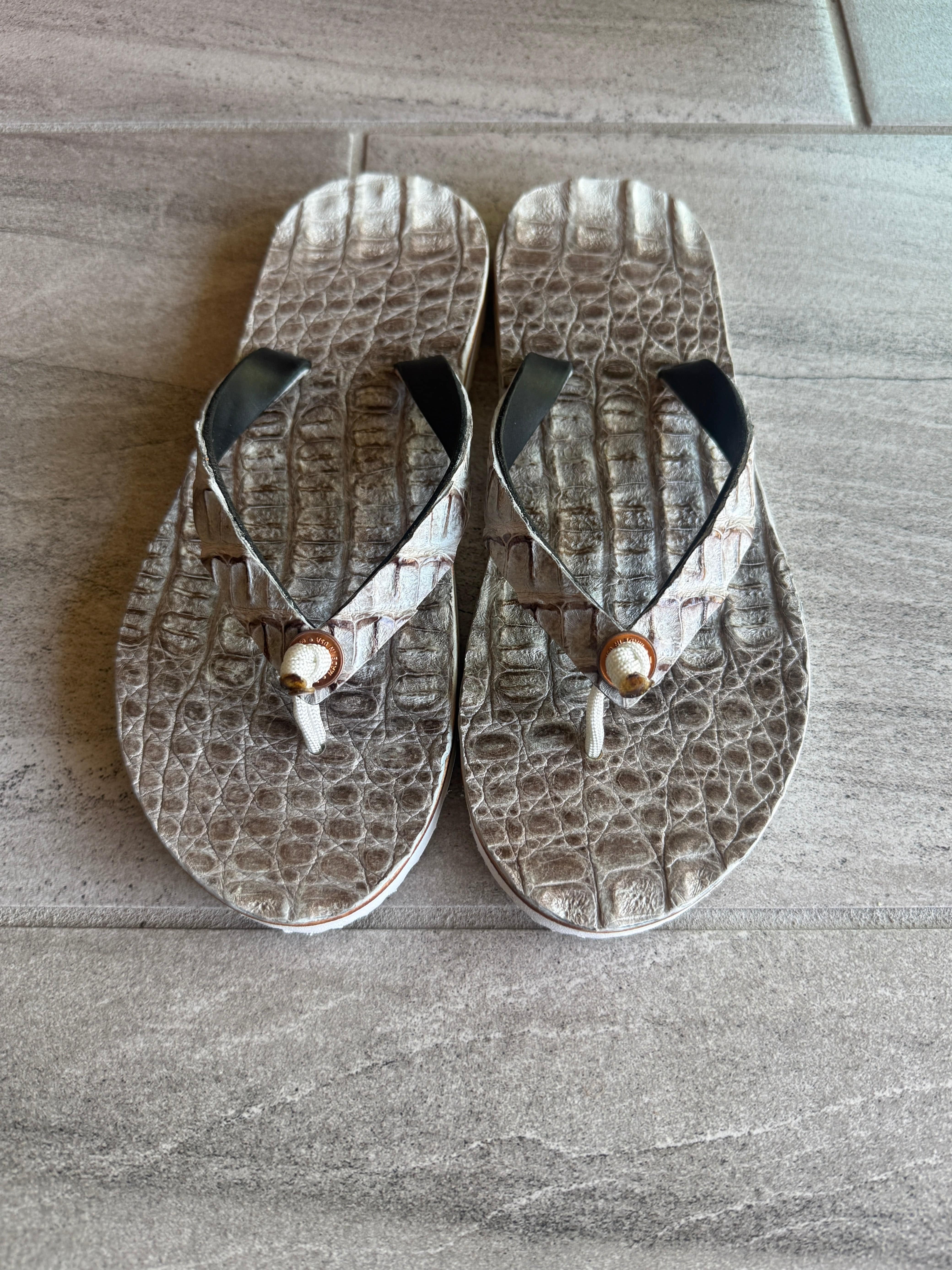 Toehold Himalayan Crocodile flip-flops featuring crocodile print design and comfortable sole, ideal for casual summer wear.