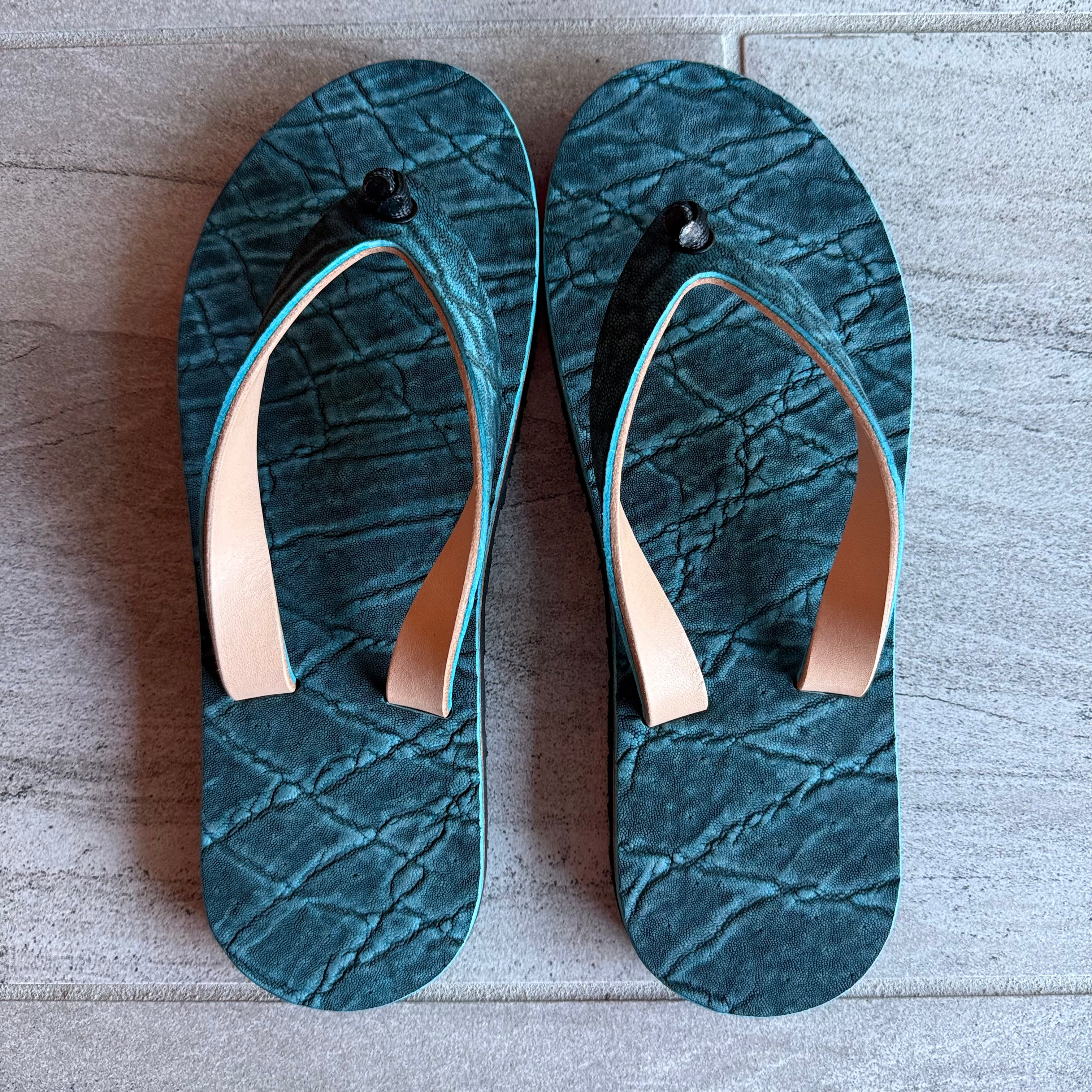Toehold South African Elephant flip-flops featuring elephant graphic and comfortable rubber soles, ideal for casual summer wear.