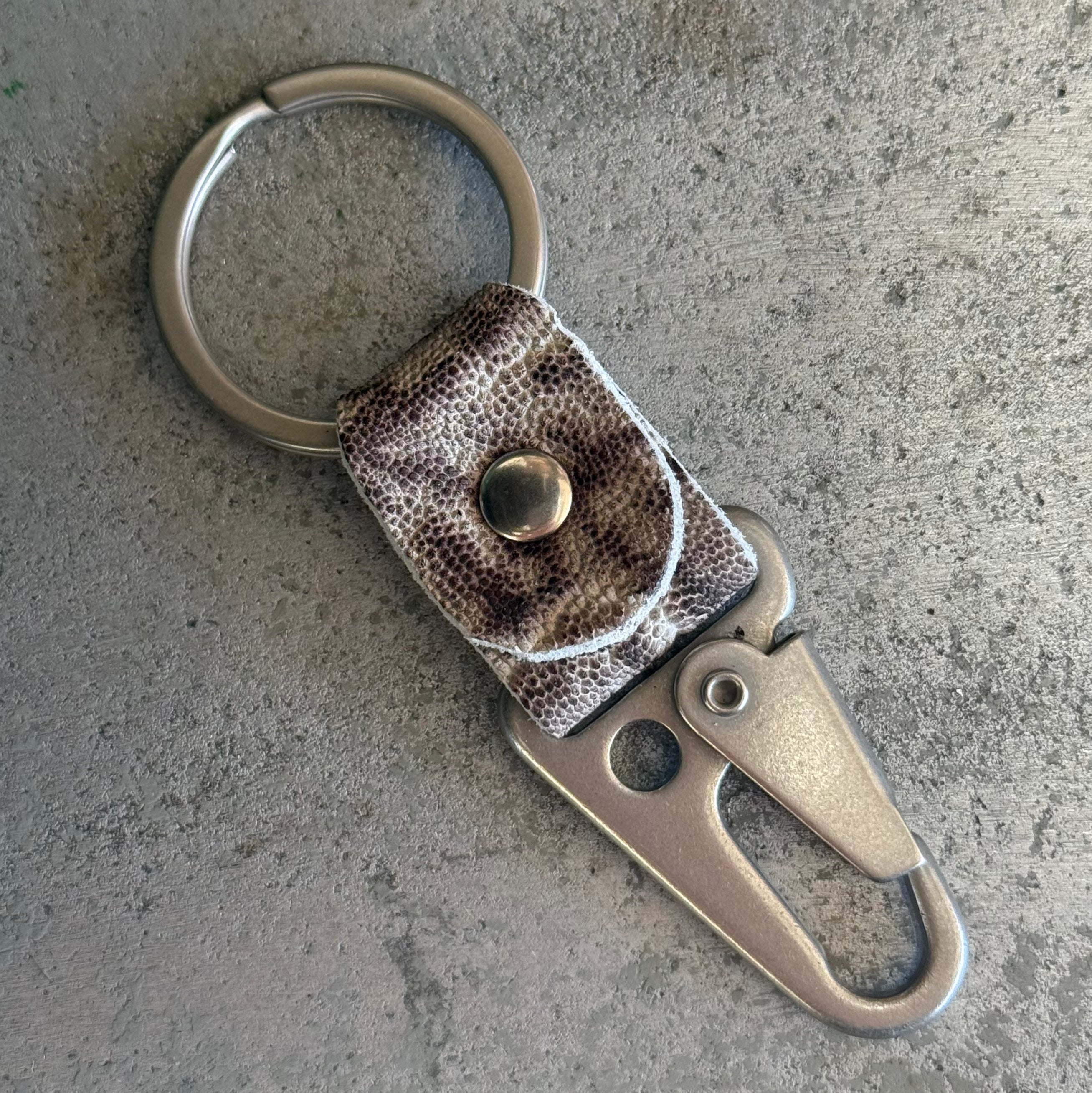 Toehold Ghost Elephant key fob with detailed elephant design on a keychain, perfect for stylish key organization