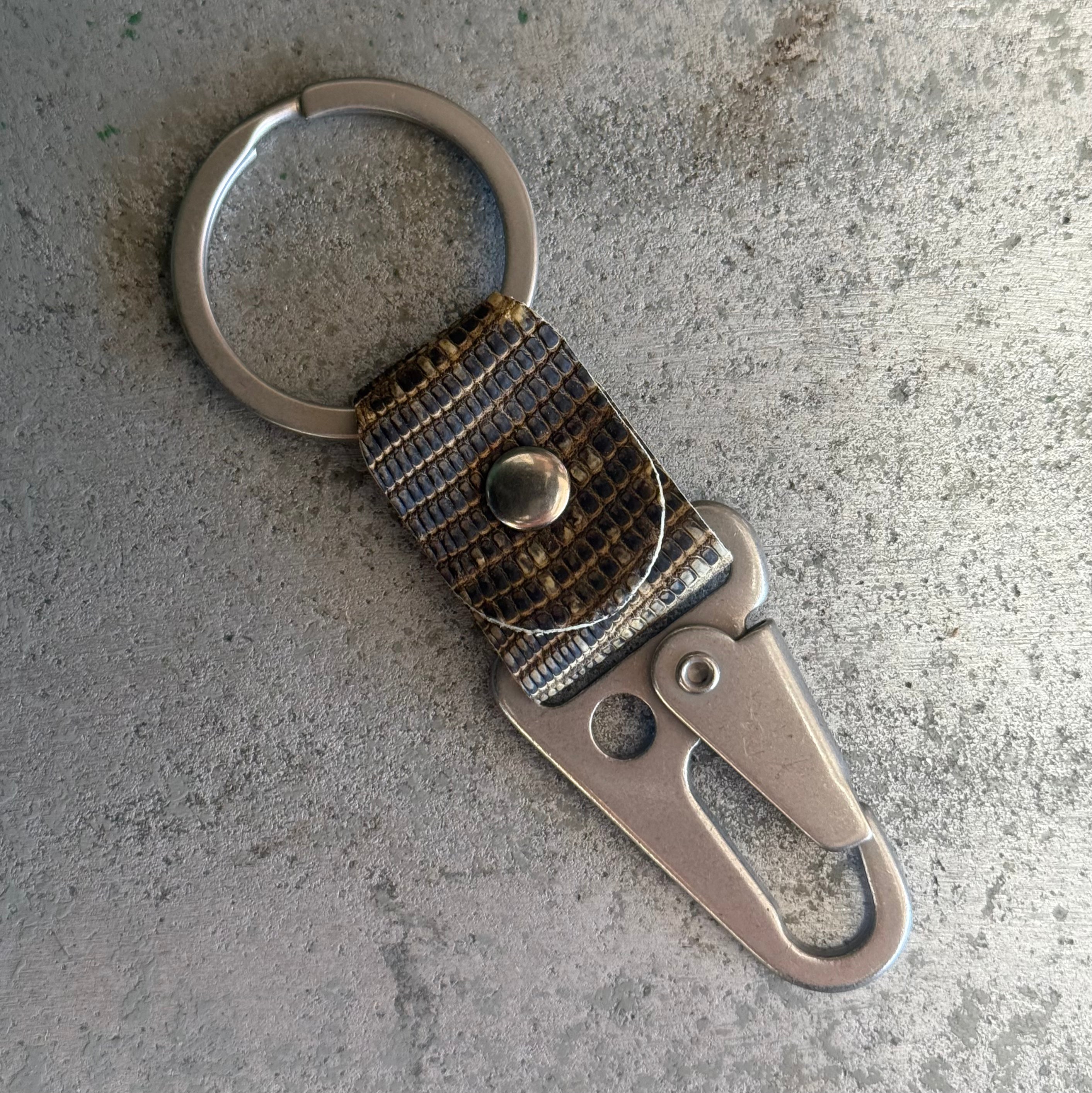 Toehold monitor lizard key fob with detailed lizard design and keyring attachment, perfect for keys or bags.