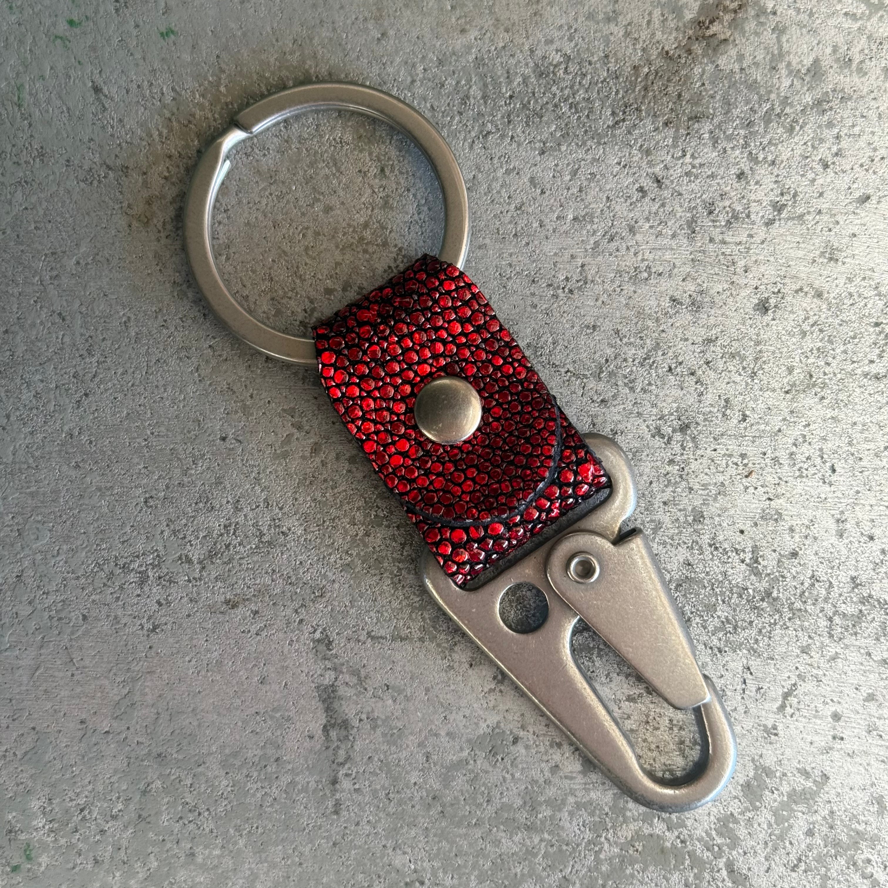 Toehold Vampire Stingray key fob with black leather and metallic accents, featuring a detailed stingray design.