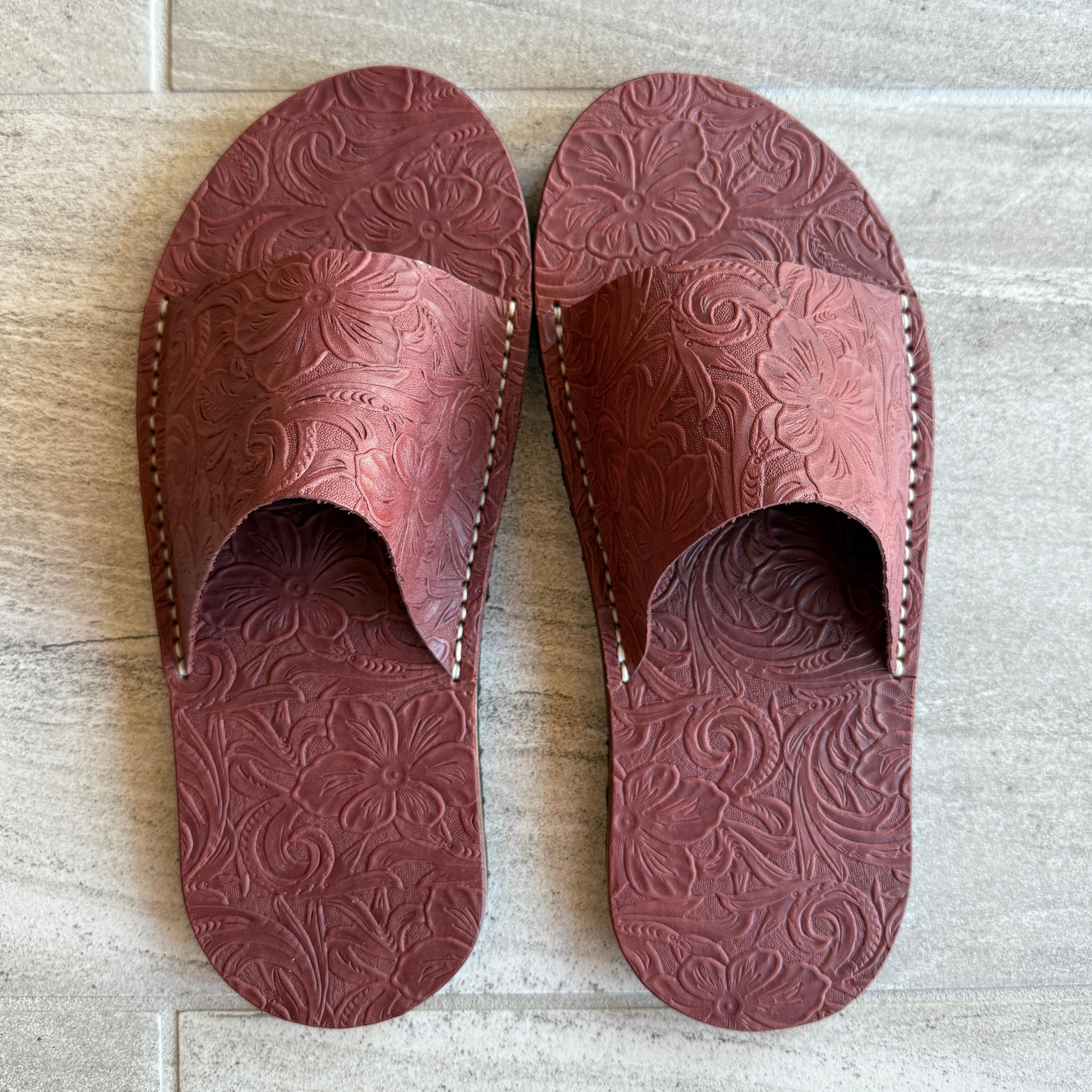 Toehold Diablo Slides in black with open toe design and cushioned sole, displayed on a neutral background.
