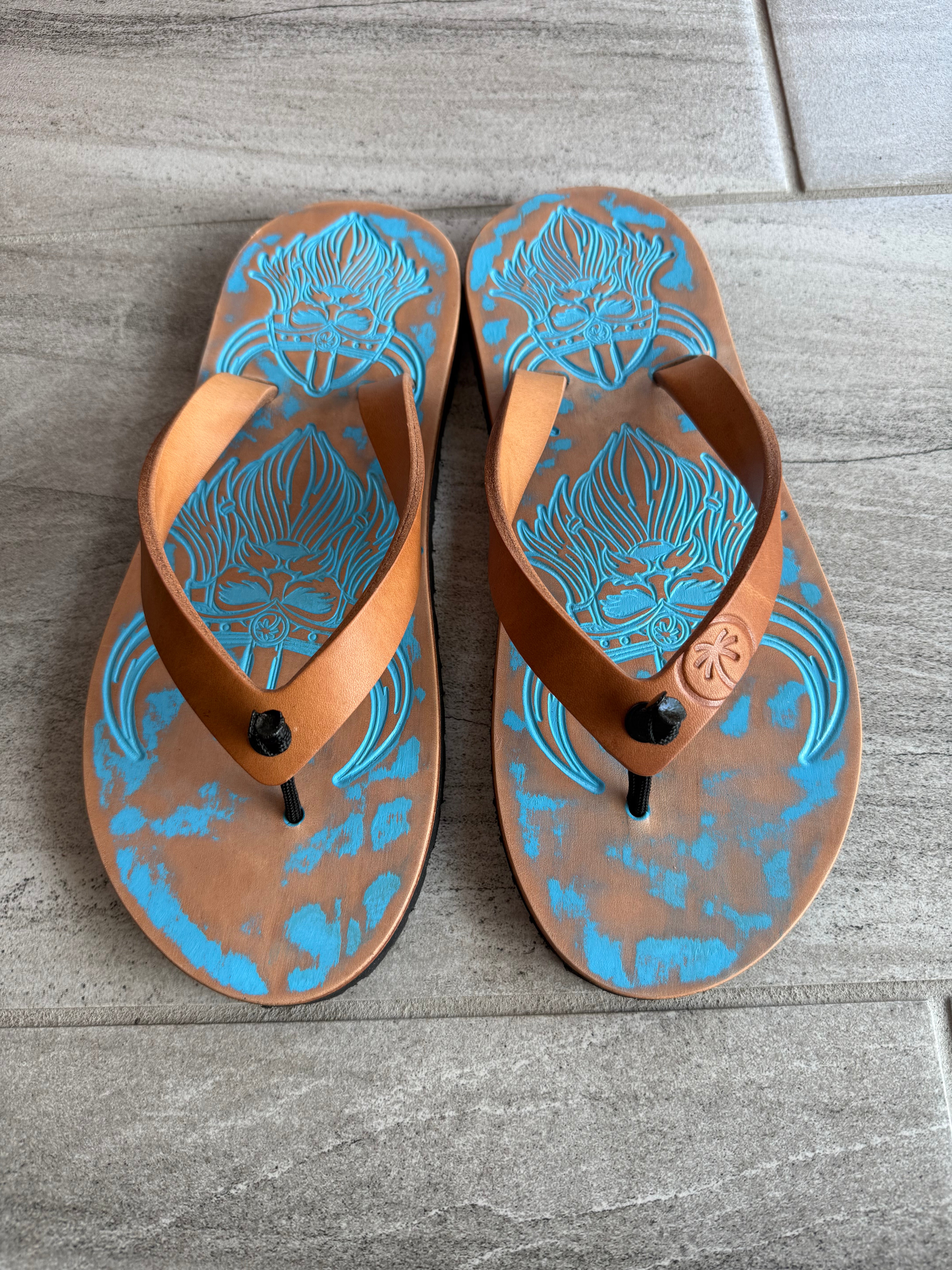 Toehold Viking flip-flops with black straps and textured footbed, designed for comfortable casual wear.