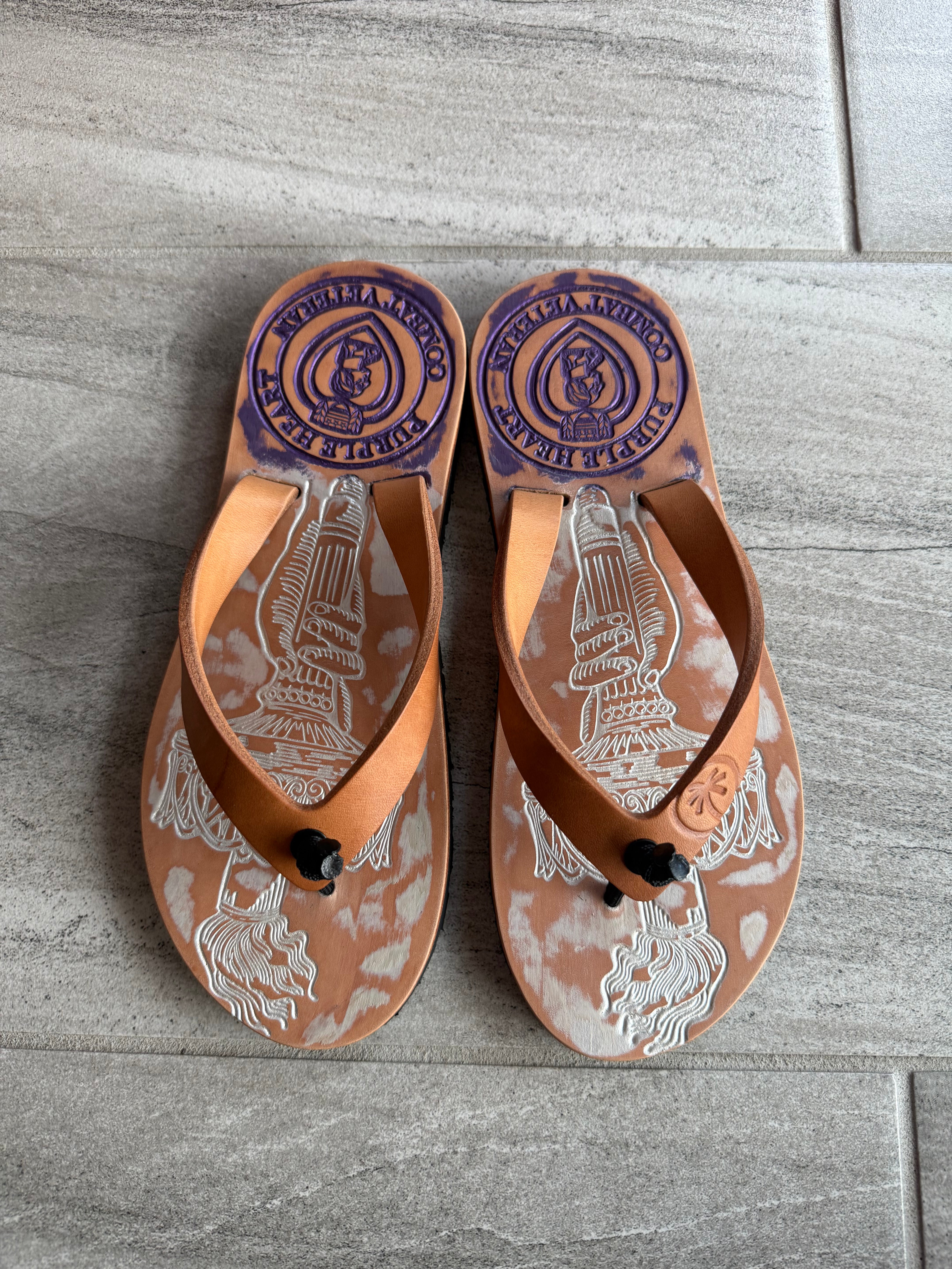 Purple Heart Toehold flip-flops with heart-shaped design and cushioned soles, perfect for casual summer wear.