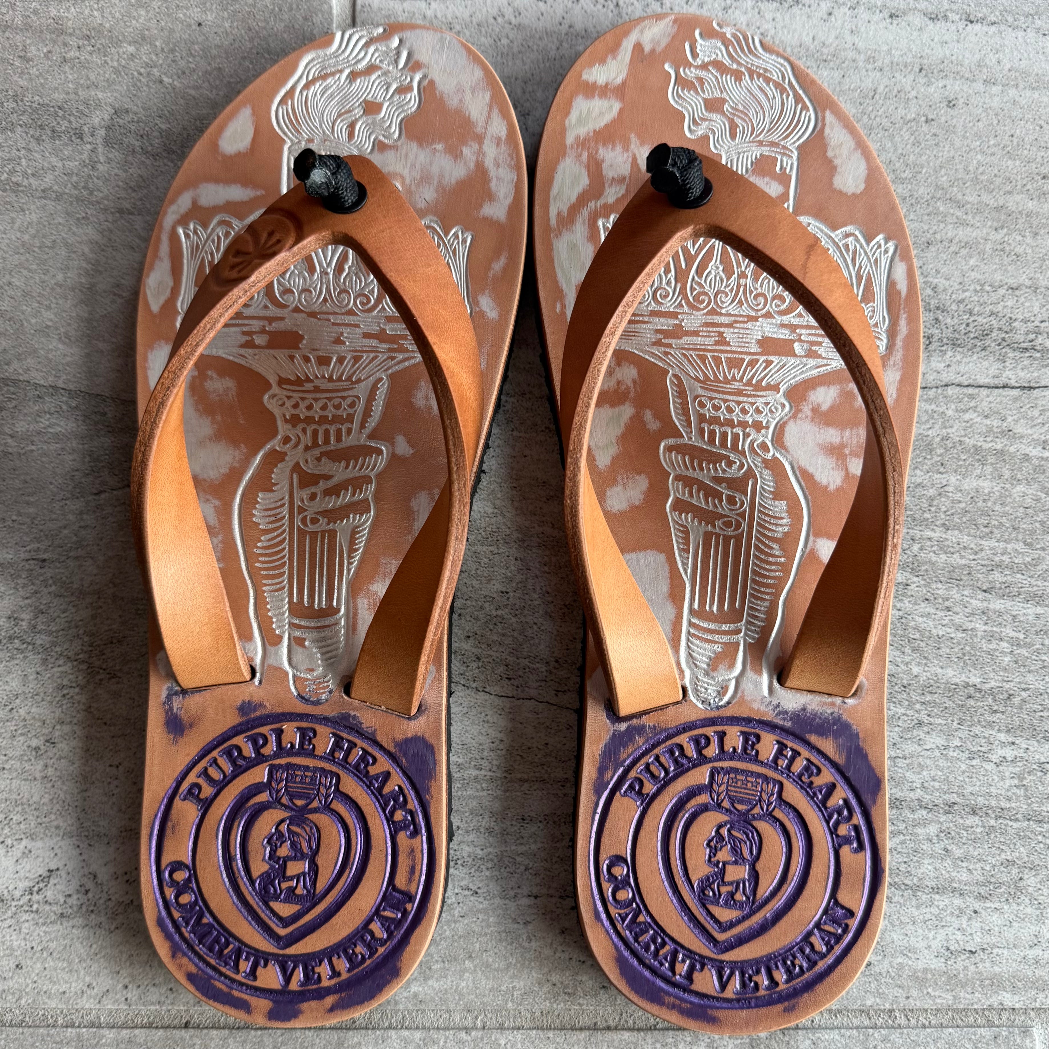 Purple Heart flip-flops by Toehold with heart-shaped design on the straps, casual footwear for warm weather.