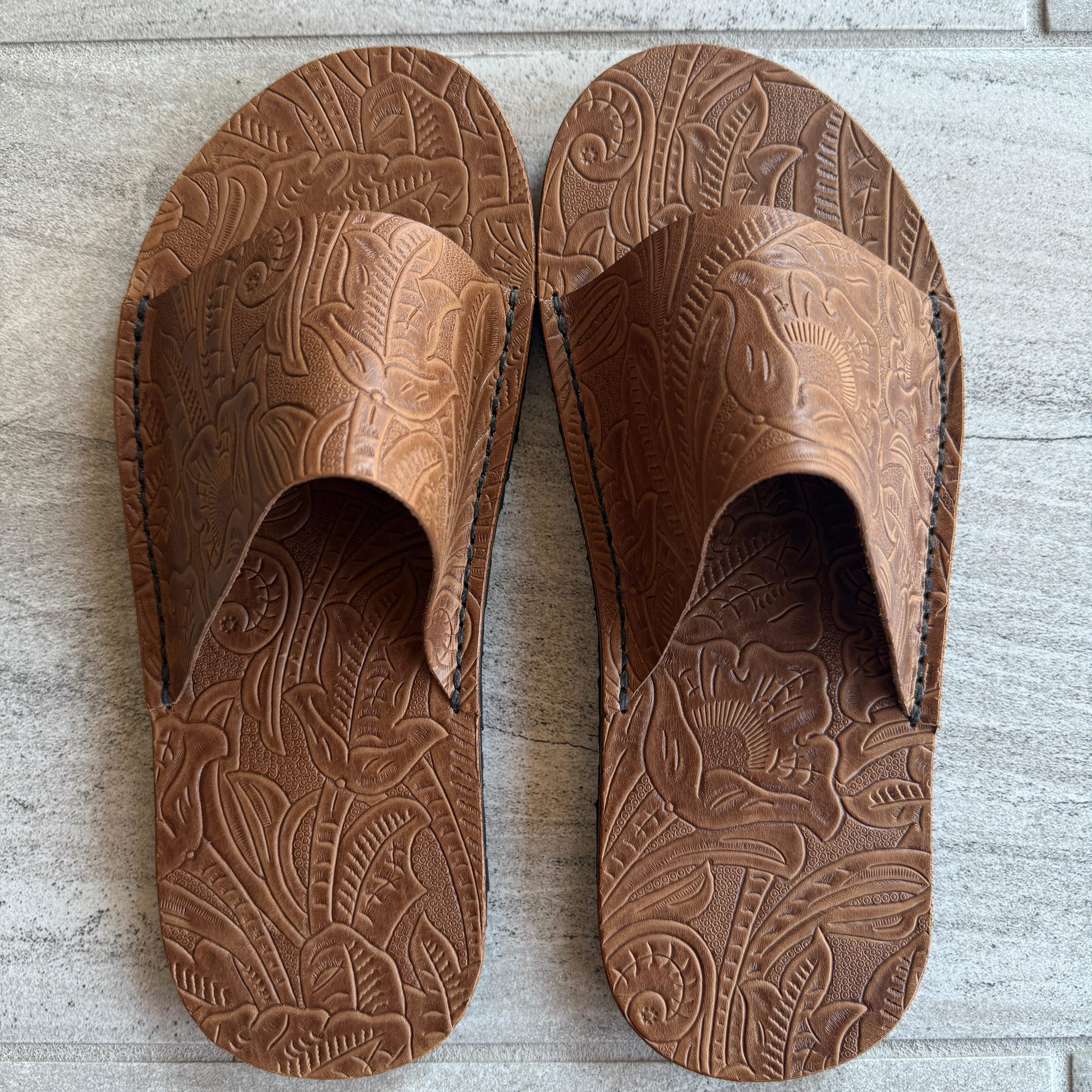 Toehold Desert Rose Slides featuring soft pink and beige straps, casual slip-on footwear with a comfortable flat sole.