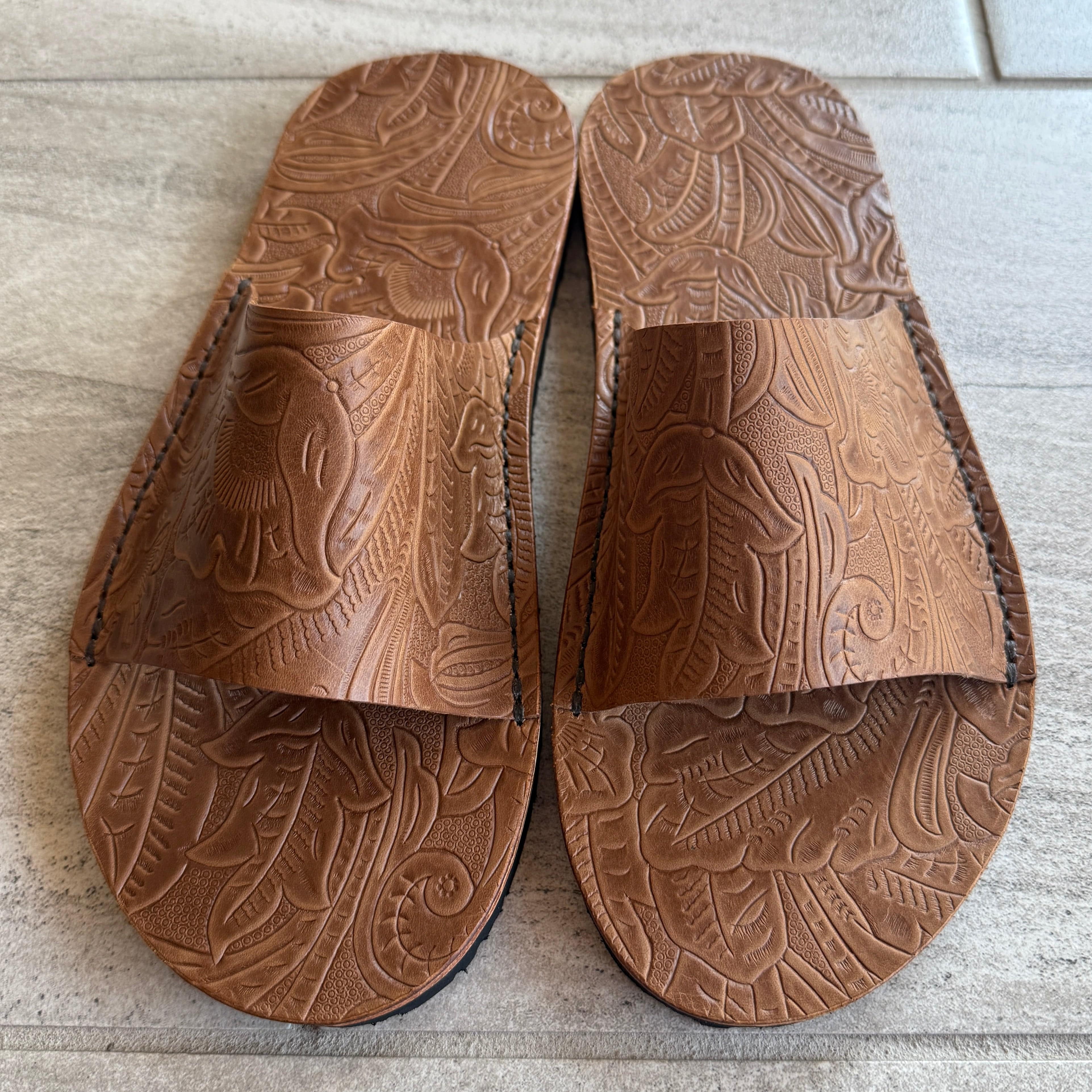 Toehold Desert Rose Slides featuring pink floral design and comfortable slip-on style for casual wear.