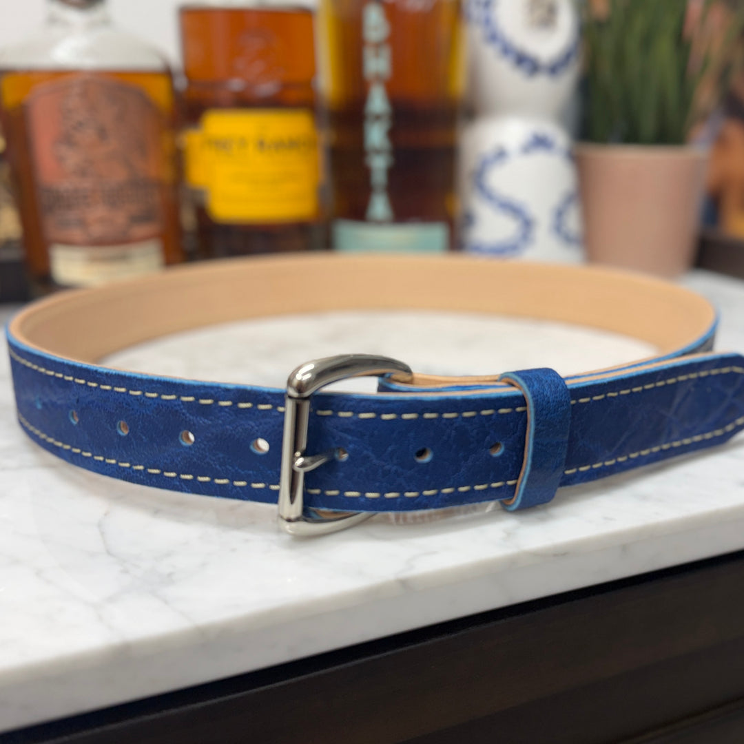 Blue Elephant Belts by Toehold featuring a vibrant blue strap and elephant-shaped buckle, styled for casual wear.