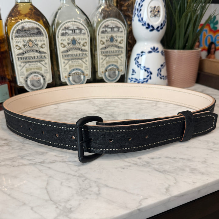 Black Elephant Belt from Toehold featuring a detailed elephant design on a sturdy leather strap.