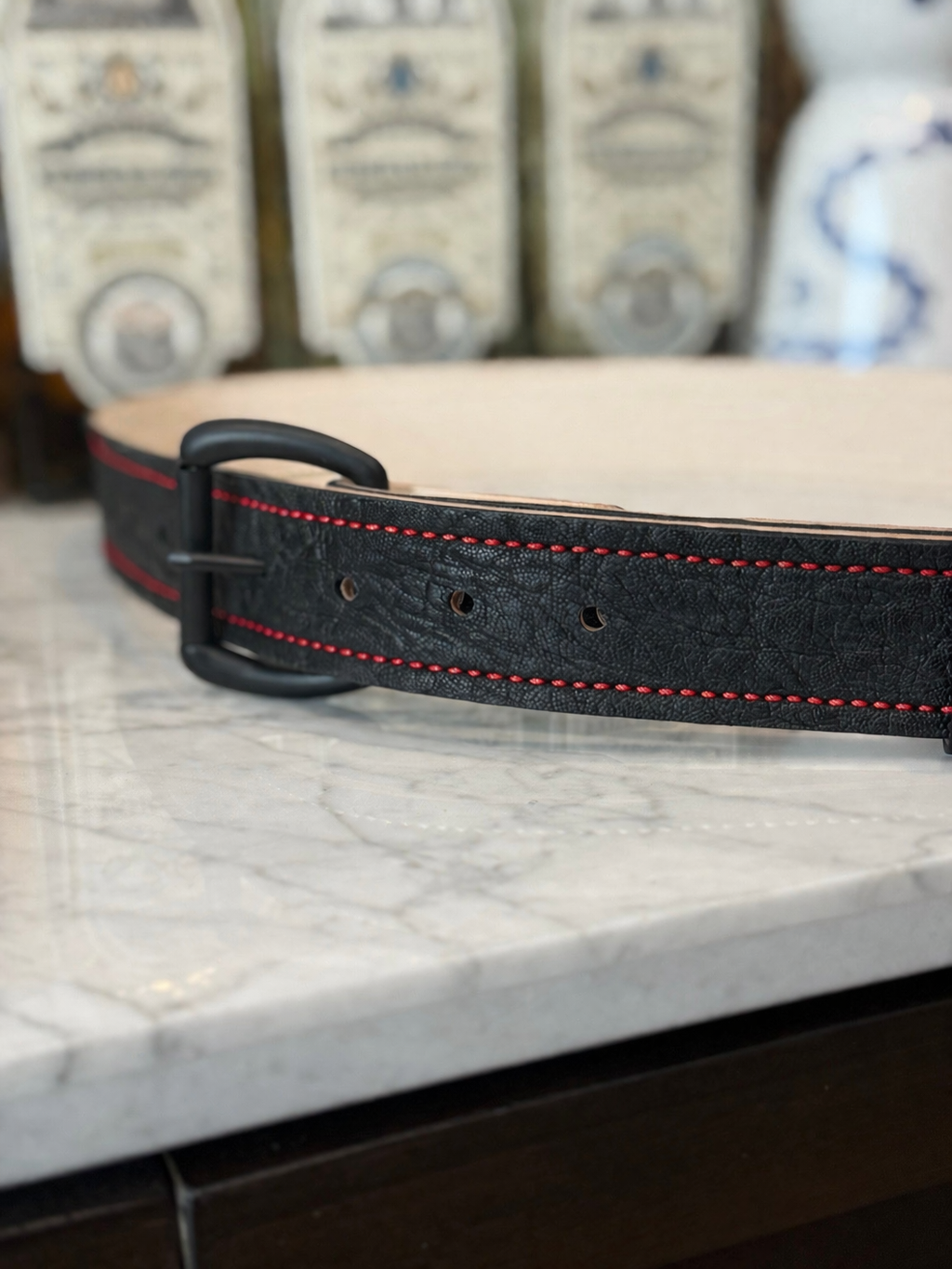 Black elephant belt by Toehold with detailed elephant design, made of durable material, perfect for casual or traditional wear.