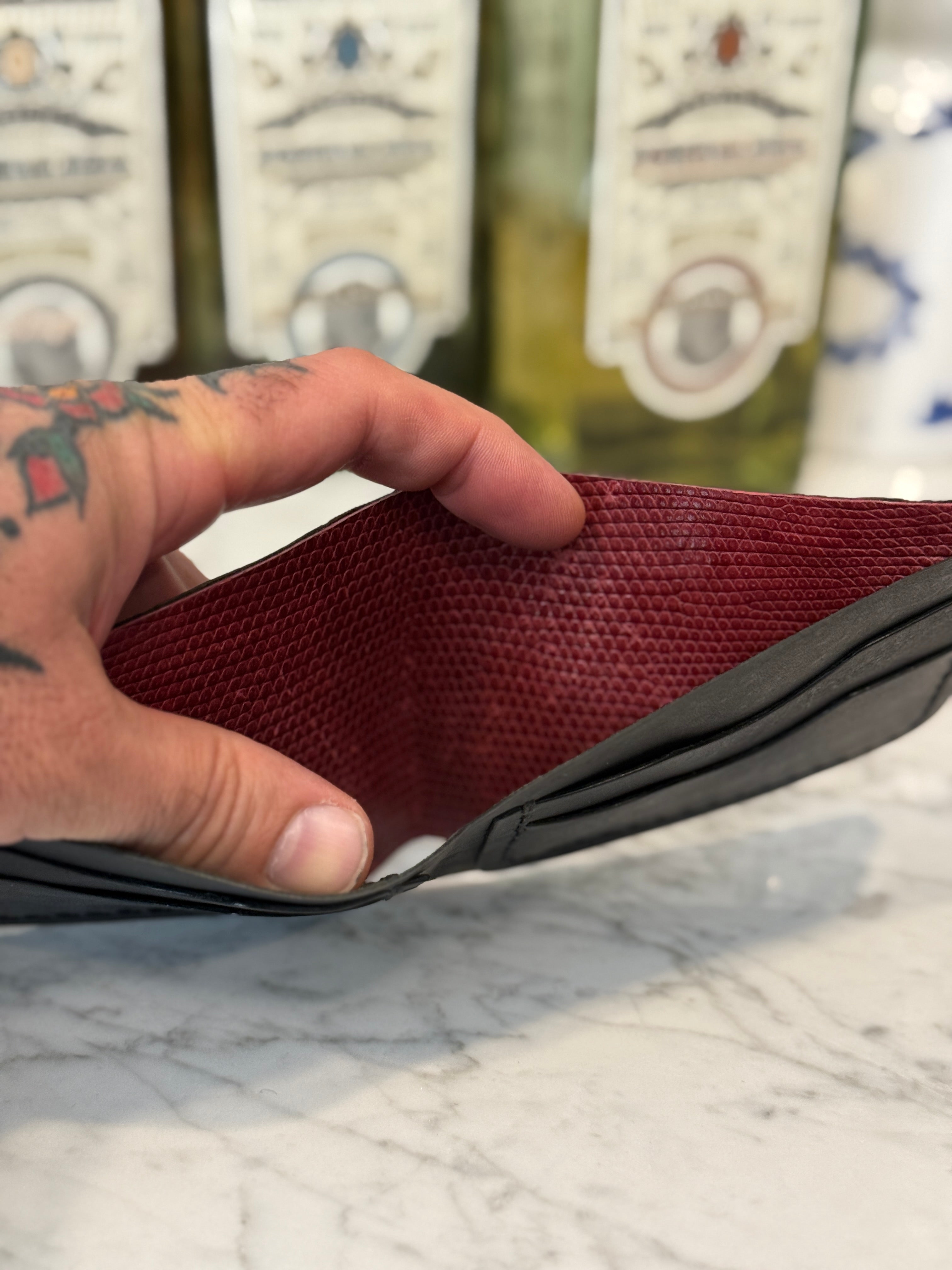 Toehold Elephant Ear Bi-Fold Wallet showing textured leather exterior and classic fold design.