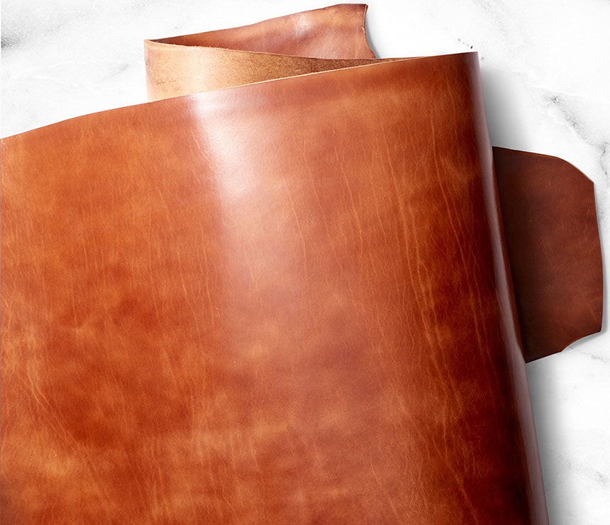 Toehold® Bag featuring sleek design and neutral color, with top handle and spacious interior for everyday use