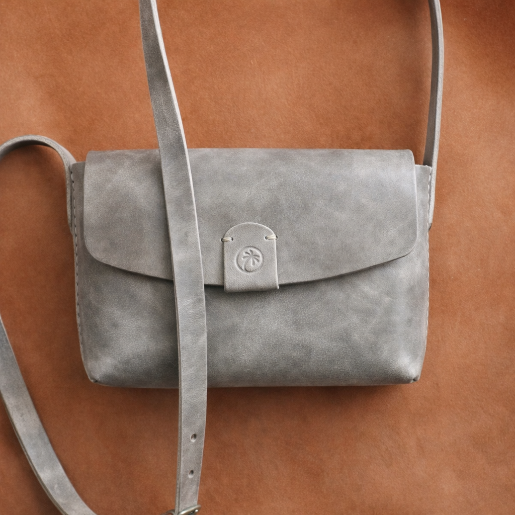 Toehold® Bag with sleek design and top handle, made of durable material, perfect for everyday use.